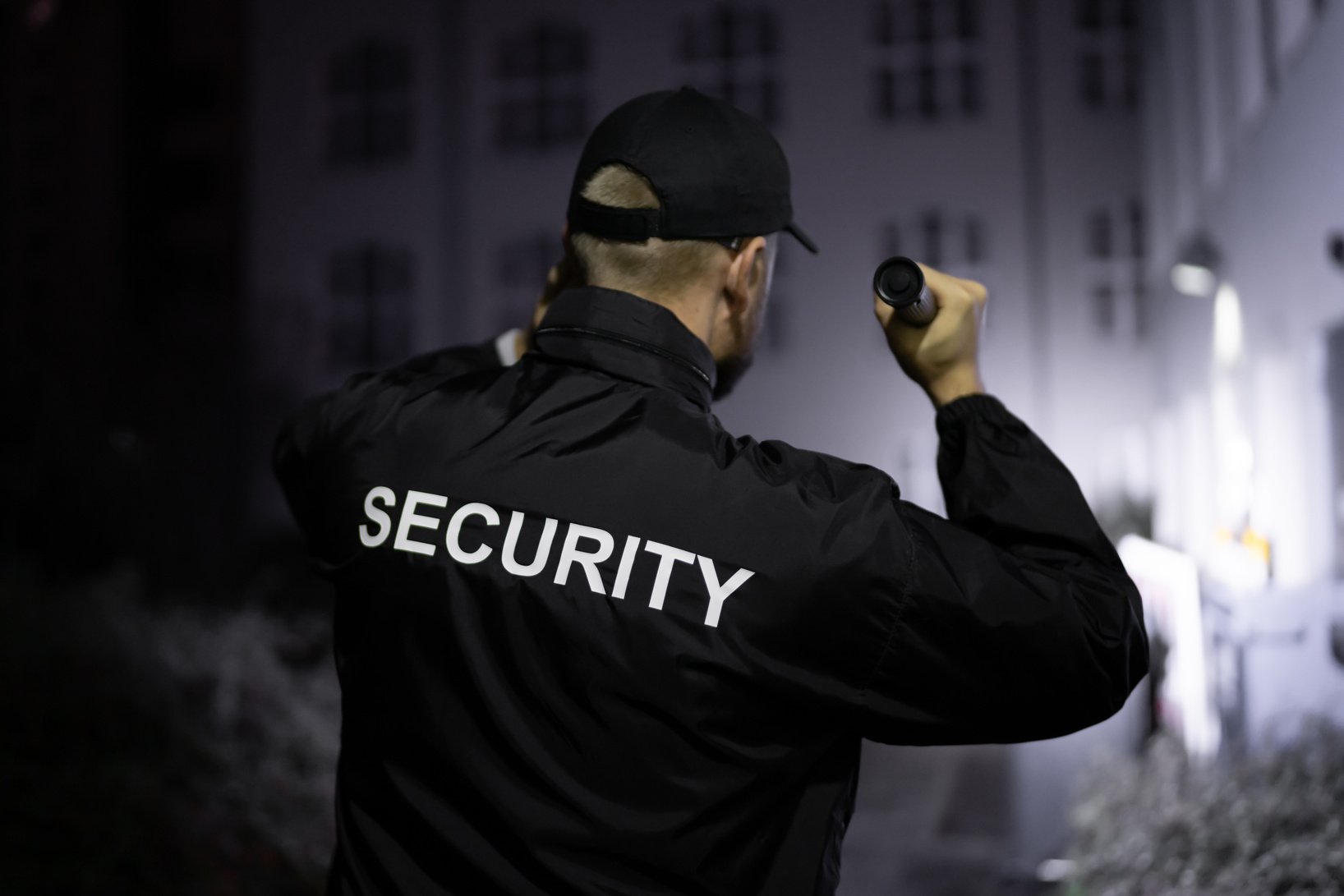 Security Guard Walking Building Perimeter